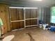 Barn interior with sliding doors, and side window, creating a simple and functional atmosphere at 106 E Wade St, Oxford, GA 30054