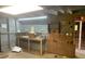 Unfinished basement with work bench and access to the backyard at 106 E Wade St, Oxford, GA 30054