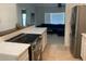 Modern kitchen seamlessly connecting to the living area, creating an open and inviting space at 106 E Wade St, Oxford, GA 30054