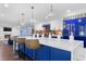 Spacious kitchen island featuring seating, pendant lighting, and custom cabinetry at 1180 Branch Water Ct, Dunwoody, GA 30338