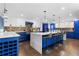 Modern kitchen with a large island, marble countertops, and stainless steel appliances at 1180 Branch Water Ct, Dunwoody, GA 30338