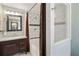 Updated bathroom with tiled shower/tub combo, modern vanity, and great lighting at 2026 Mcdaniel Mill Sw Rd, Conyers, GA 30094
