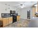 Well-equipped kitchen featuring modern appliances, tile backsplash, and ample counter space for cooking at 2026 Mcdaniel Mill Sw Rd, Conyers, GA 30094