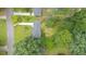 Aerial view of the property showcasing the house, surrounding greenery, and neighborhood at 2100 Shady Ln, Tucker, GA 30084