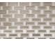 Close up of new marble mosaic tiling backsplash in a bright bathroom at 2100 Shady Ln, Tucker, GA 30084