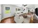 Comfortable living room with cozy furniture and an open floor plan to a dining area at 2100 Shady Ln, Tucker, GA 30084
