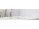 Close-up of a marble vanity with modern faucet at 2100 Shady Ln, Tucker, GA 30084