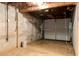 Unfinished garage with concrete walls and floors, perfect for storage or renovation purposes at 4339 Sasanqua Ct, Tucker, GA 30084