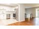 Modern kitchen with stainless steel appliances, white cabinets, and granite countertops at 4339 Sasanqua Ct, Tucker, GA 30084