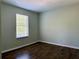 Cozy bedroom with wood floors and lots of natural lighting at 5105 N Bridges Dr, Alpharetta, GA 30022