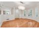 Open dining room with hardwood floors, natural light and direct kitchen access at 1416 Oakridge Cir, Decatur, GA 30033