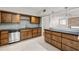 Kitchen featuring a breakfast bar, stainless steel appliances, and custom cabinetry at 1416 Oakridge Cir, Decatur, GA 30033