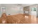 Spacious living room with hardwood floors and stone fireplace, offering a cozy ambiance at 1416 Oakridge Cir, Decatur, GA 30033