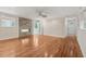Comfortable living room featuring hardwood floors, stone fireplace and lots of natural light at 1416 Oakridge Cir, Decatur, GA 30033