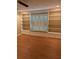 Spacious living room with built-in bookshelves and a window seat at 1416 Oakridge Cir, Decatur, GA 30033
