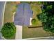 Aerial view of home highlighting roof, driveway, landscaping, and fenced backyard at 1657 Hampton Woods Way, Lawrenceville, GA 30043