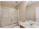 Bathroom with tiled shower, and ample vanity space at 1657 Hampton Woods Way, Lawrenceville, GA 30043