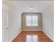 Small and well-lit bedroom with beautiful wood floors at 1657 Hampton Woods Way, Lawrenceville, GA 30043