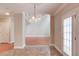 Kitchen with tile floors and adjacent rooms at 1657 Hampton Woods Way, Lawrenceville, GA 30043
