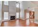 Spacious living room boasts a fireplace with high ceilings and natural light at 1657 Hampton Woods Way, Lawrenceville, GA 30043