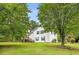 Spacious backyard featuring a wooden deck, perfect for outdoor entertaining at 524 Stephens Point Se Dr, Lawrenceville, GA 30045