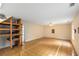 Expansive bonus room featuring hardwood floors, and versatile space for recreation or storage at 524 Stephens Point Se Dr, Lawrenceville, GA 30045