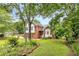 Well-kept lawn and landscaping surround this house, creating a beautiful curb appeal at 524 Stephens Point Se Dr, Lawrenceville, GA 30045