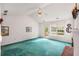 Open living room with vaulted ceilings, natural light, and access to outdoor deck at 524 Stephens Point Se Dr, Lawrenceville, GA 30045