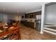 Basement features small kitchen and dining area with tile flooring at 8601 Flint Hill Rd, Douglasville, GA 30135