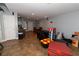 Spacious basement area with tile floors, recessed lighting, and multiple access doors at 8601 Flint Hill Rd, Douglasville, GA 30135