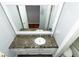 Bathroom features granite countertop, tiled floors, and a bathtub/shower combo at 8601 Flint Hill Rd, Douglasville, GA 30135