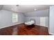 Bedroom features hardwood floors, recessed lighting, and one window at 8601 Flint Hill Rd, Douglasville, GA 30135
