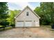 Spacious three-car garage with ample parking and storage space at 8601 Flint Hill Rd, Douglasville, GA 30135