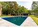 Beautiful in-ground pool with ample concrete deck is perfect for entertaining and enjoying the outdoors at 8601 Flint Hill Rd, Douglasville, GA 30135