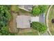 Aerial view shows a house with a large roof, fenced backyard, and proximity to a quiet neighborhood street at 1029 Harvest Brook Dr, Lawrenceville, GA 30043