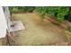 Spacious fenced backyard with a concrete patio, perfect for outdoor activities at 1029 Harvest Brook Dr, Lawrenceville, GA 30043