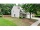 Lovely home showcasing a well-kept lawn, a two-car garage, and a welcoming front porch at 1029 Harvest Brook Dr, Lawrenceville, GA 30043