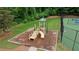 Community playground and tennis court, perfect for outdoor activities and recreation at 1029 Harvest Brook Dr, Lawrenceville, GA 30043