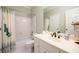 Bathroom featuring a tile floor, vanity, and shower-tub combination at 1304 Carrington Way, Lawrenceville, GA 30044