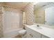 Bathroom with white vanity, toilet and tub with shower at 1304 Carrington Way, Lawrenceville, GA 30044