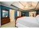 Spacious bedroom with tray ceilings, carpet floors, closet, and walk-in bathroom at 1304 Carrington Way, Lawrenceville, GA 30044