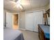 Bedroom with closet and entry to hallway at 1304 Carrington Way, Lawrenceville, GA 30044