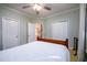 Comfortable bedroom featuring neutral walls, a ceiling fan, and carpeting at 1304 Carrington Way, Lawrenceville, GA 30044