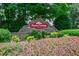 Stone entrance to Flowers Crossing at The Mill community at 1304 Carrington Way, Lawrenceville, GA 30044