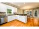 Bright eat-in kitchen with stainless appliances, granite counters, and a breakfast area at 1304 Carrington Way, Lawrenceville, GA 30044