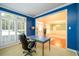 Stylish office with built-in shelving, large windows, and access to the entryway at 1304 Carrington Way, Lawrenceville, GA 30044