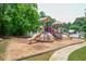 Bright and colorful community playground featuring slides and climbing areas for children of all ages at 1304 Carrington Way, Lawrenceville, GA 30044