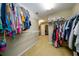 Walk-in closet with extensive shelving and ample storage space for an organized wardrobe at 1304 Carrington Way, Lawrenceville, GA 30044