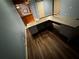 Finished basement with wood-look floors, wet bar, and office area with a workstation at 351 Oak Harbor Trl, Marietta, GA 30066