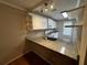 Bright kitchen area with granite countertops, modern appliances, and an open design at 351 Oak Harbor Trl, Marietta, GA 30066